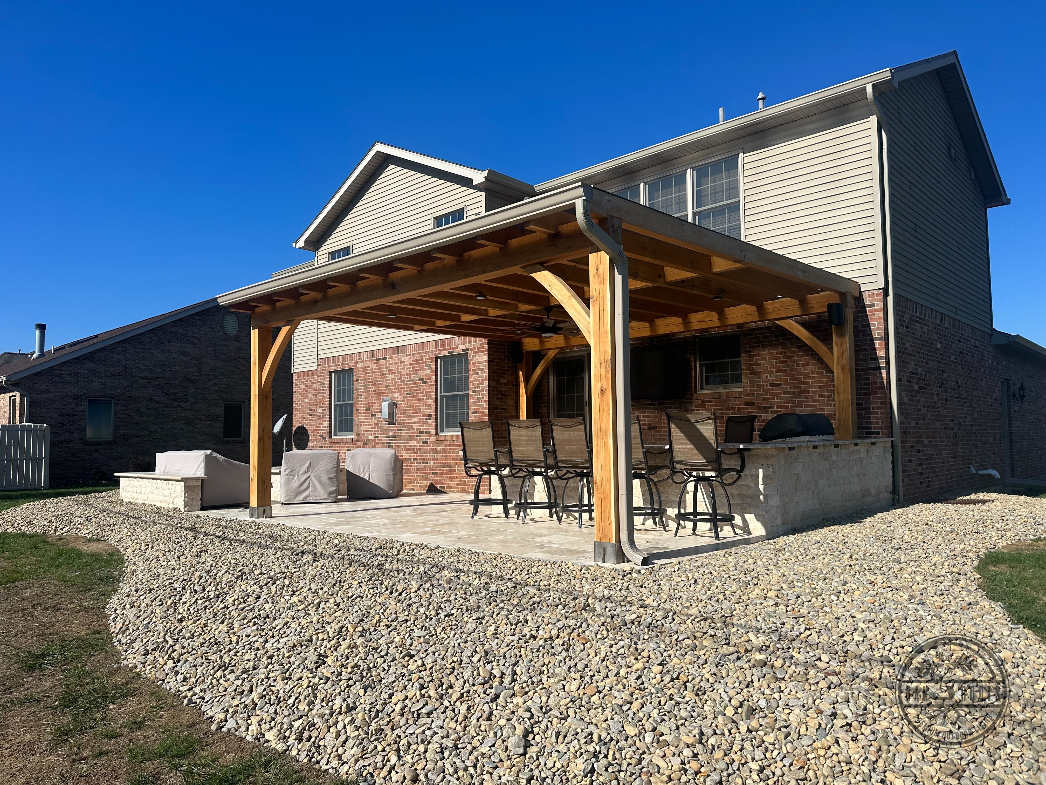 Pool and patio outdoor living area by Oak Roots LLC Milan Indiana