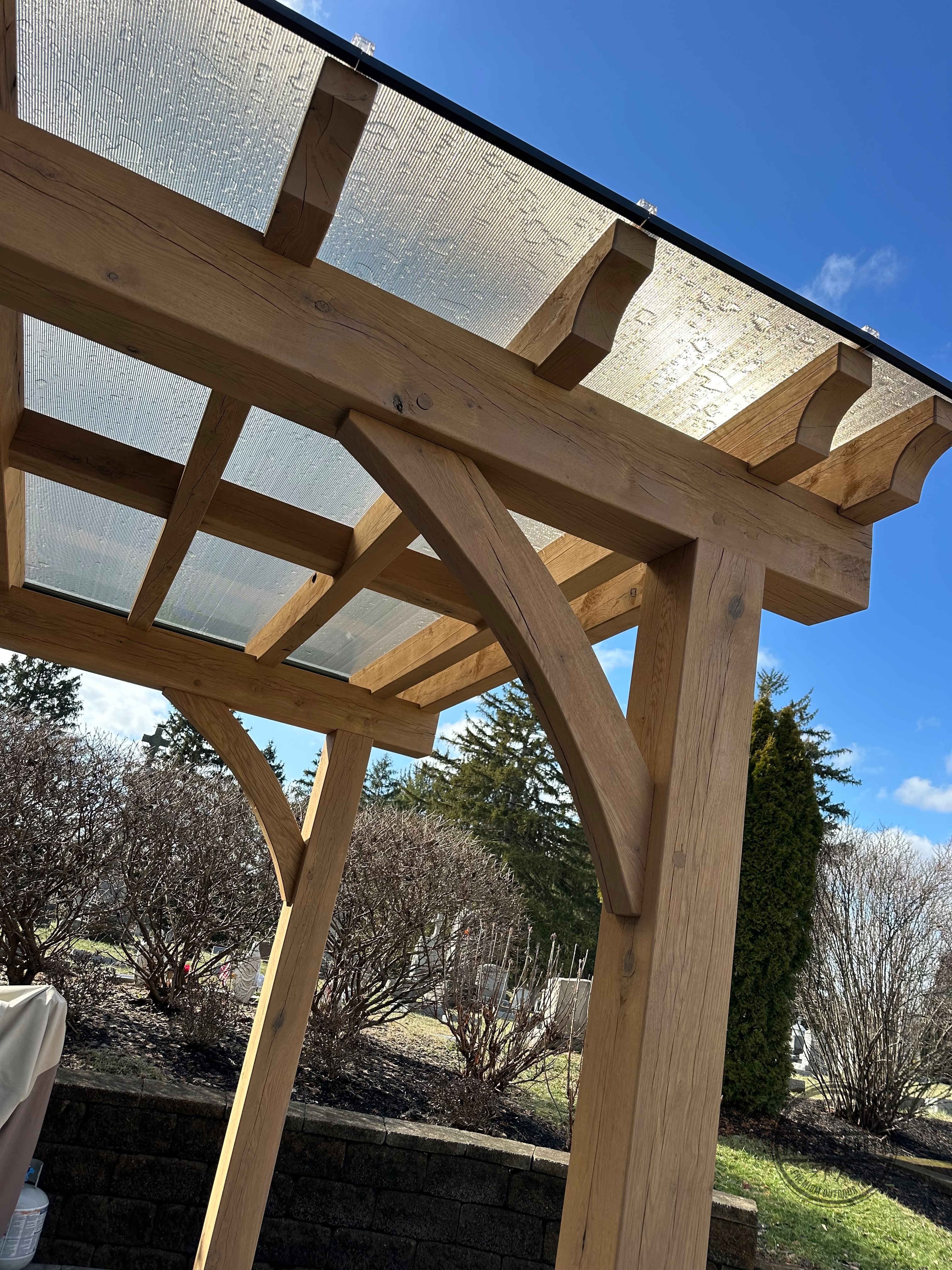 Attached timber frame pergola by Oak Roots LLC Milan Indiana
